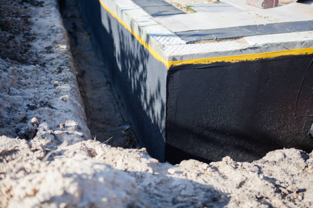 Professional Waterproofing technician working in Benedict, MD